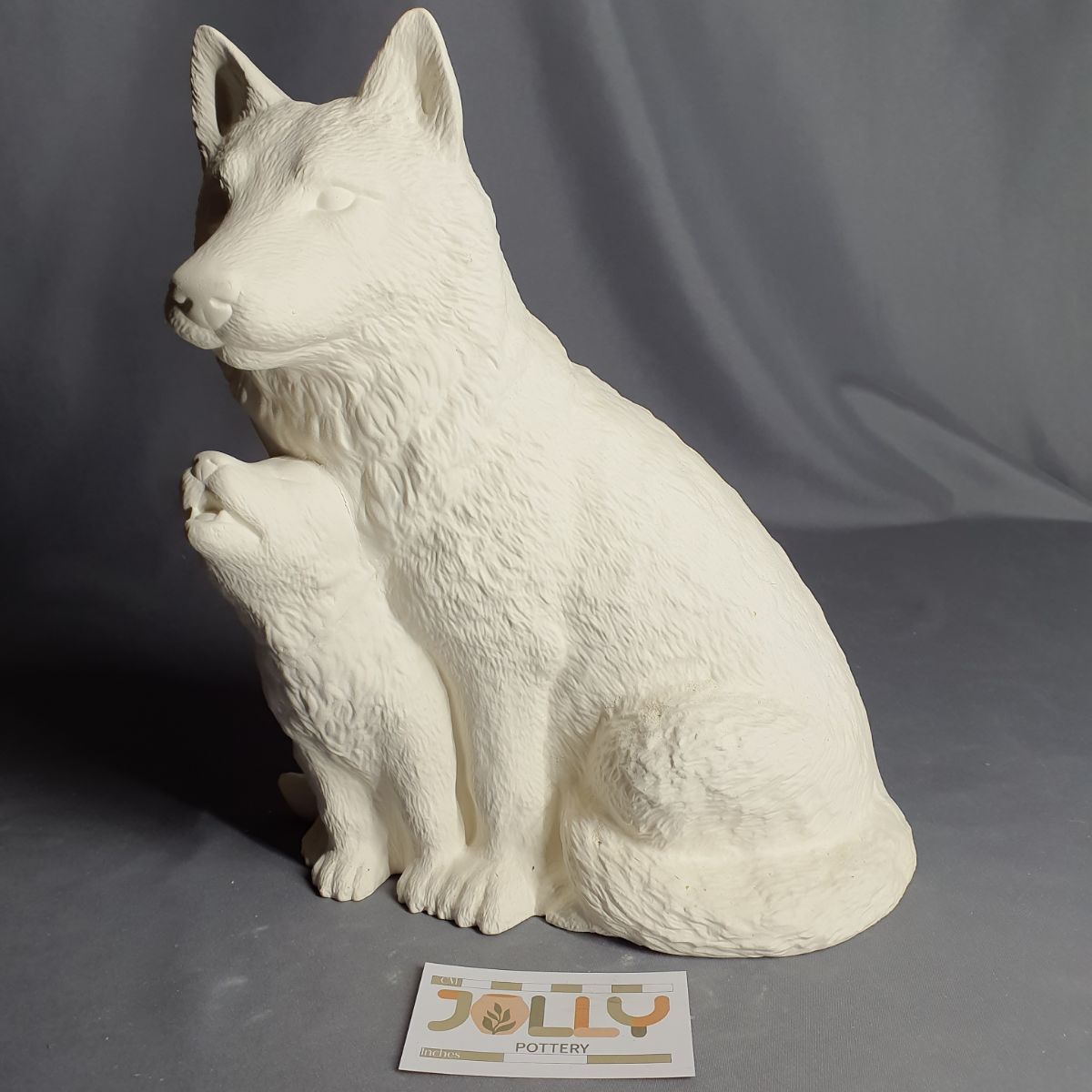 Wolf Sitting with Pup