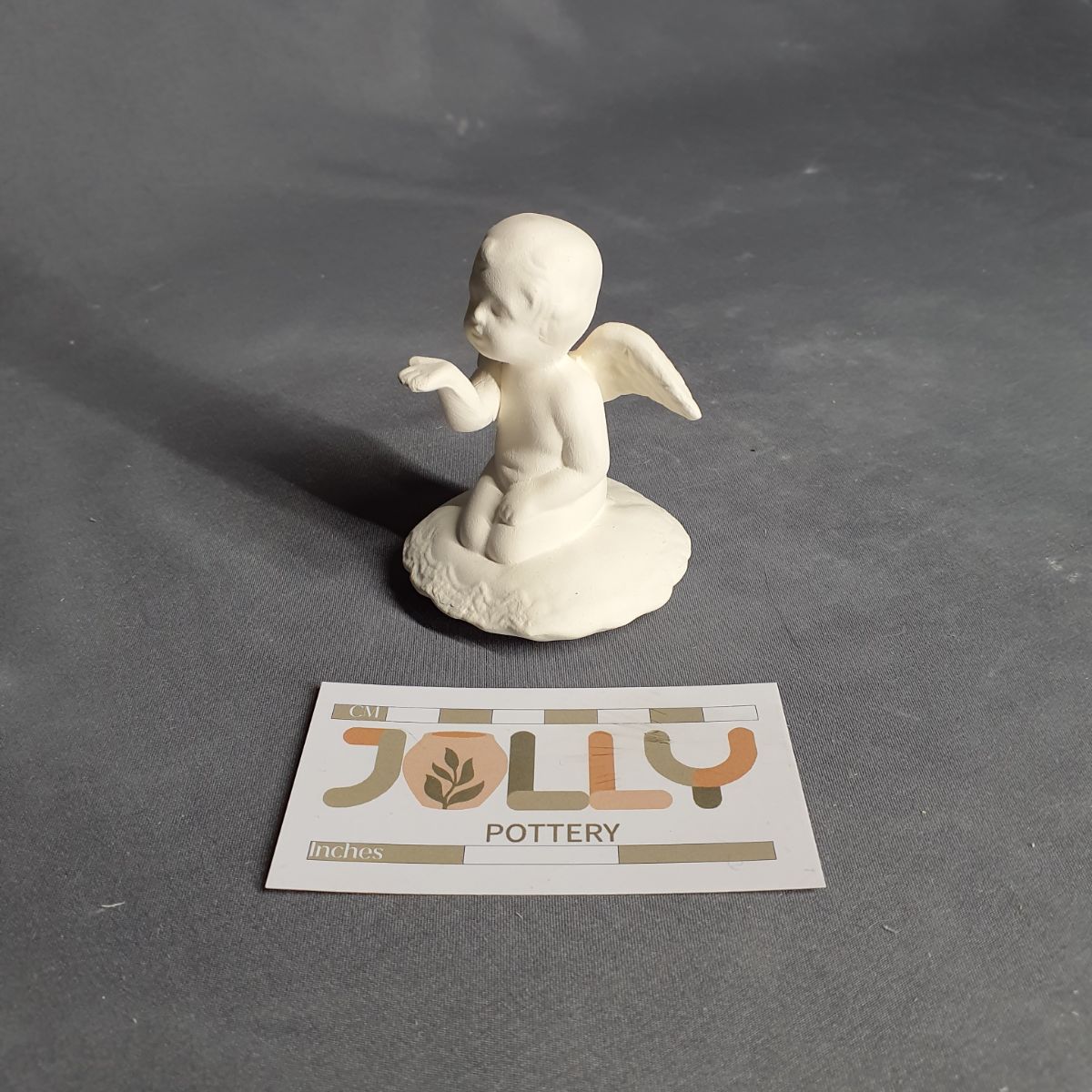 Small Cherub Blowing Kisses