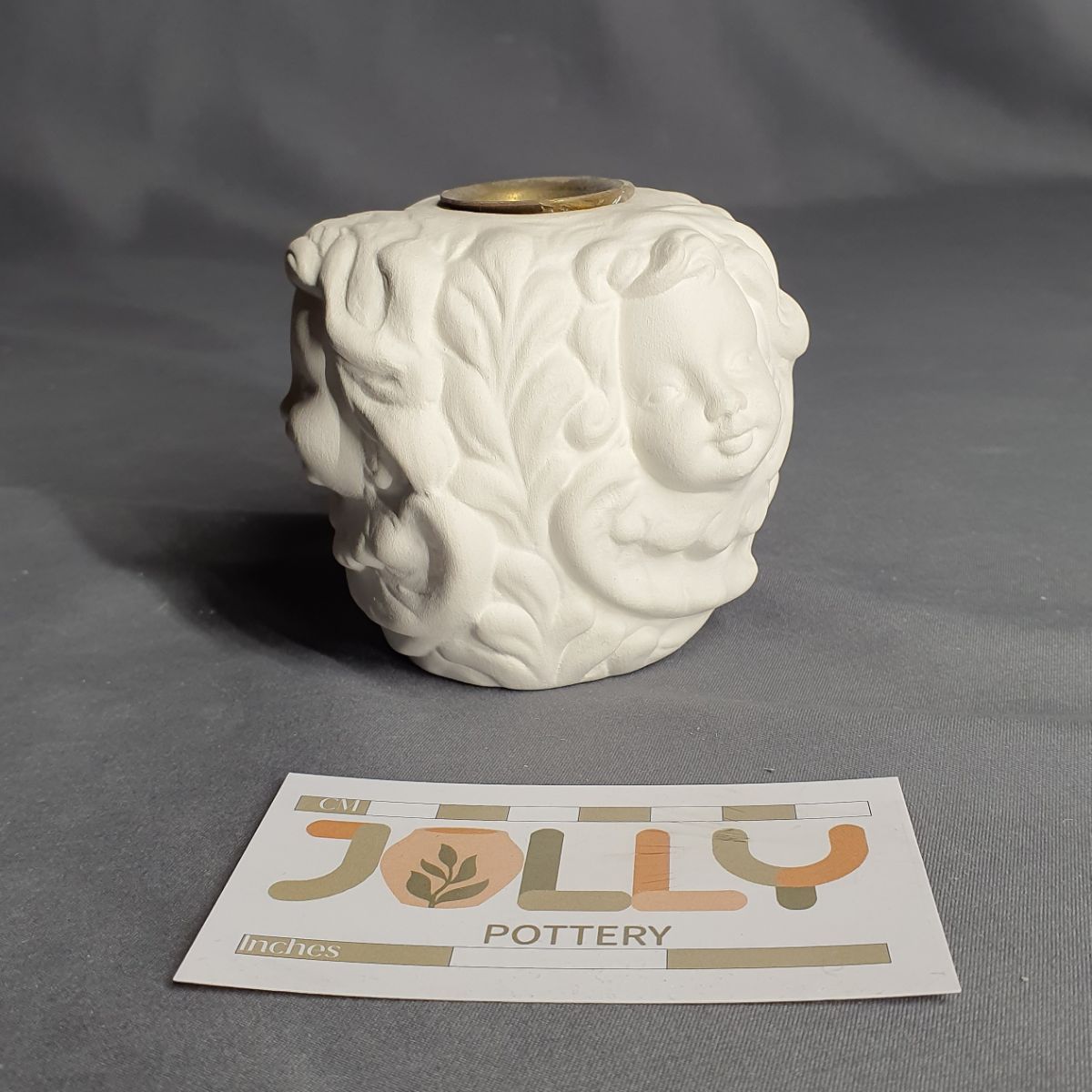 Cherub Head Candlestick Holder