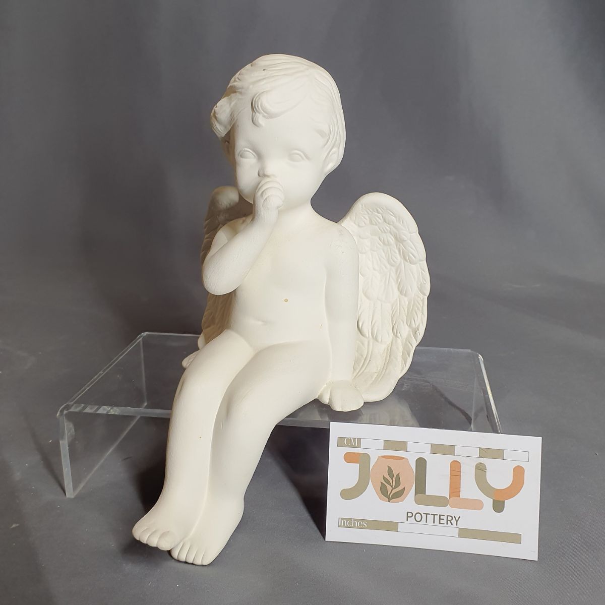 Cherub Sucking Thumb