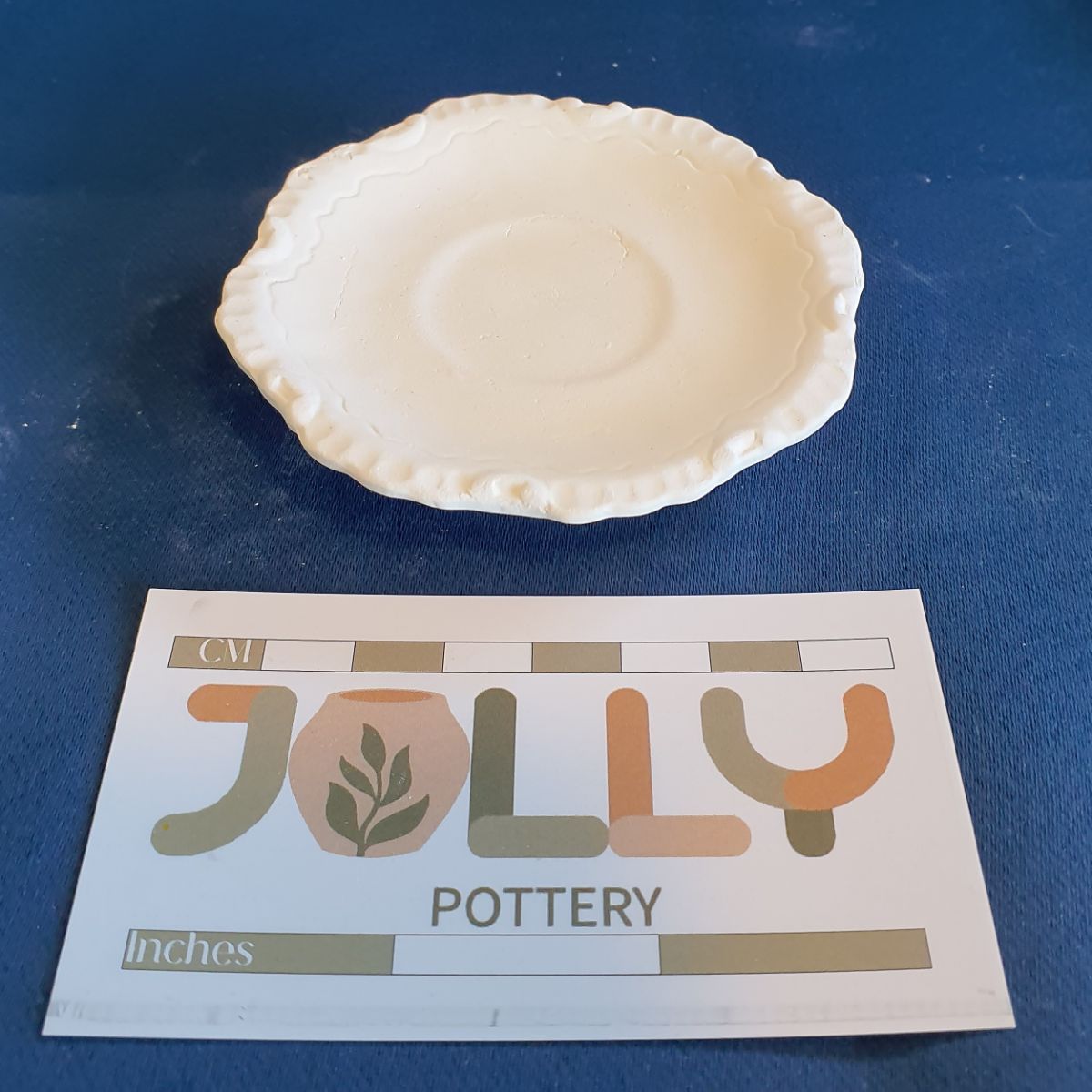 Cream Pot and Saucer