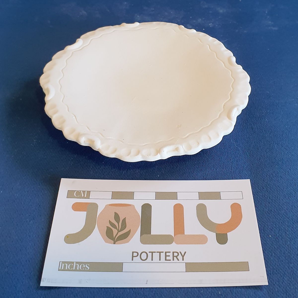 Cream Pot and Saucer
