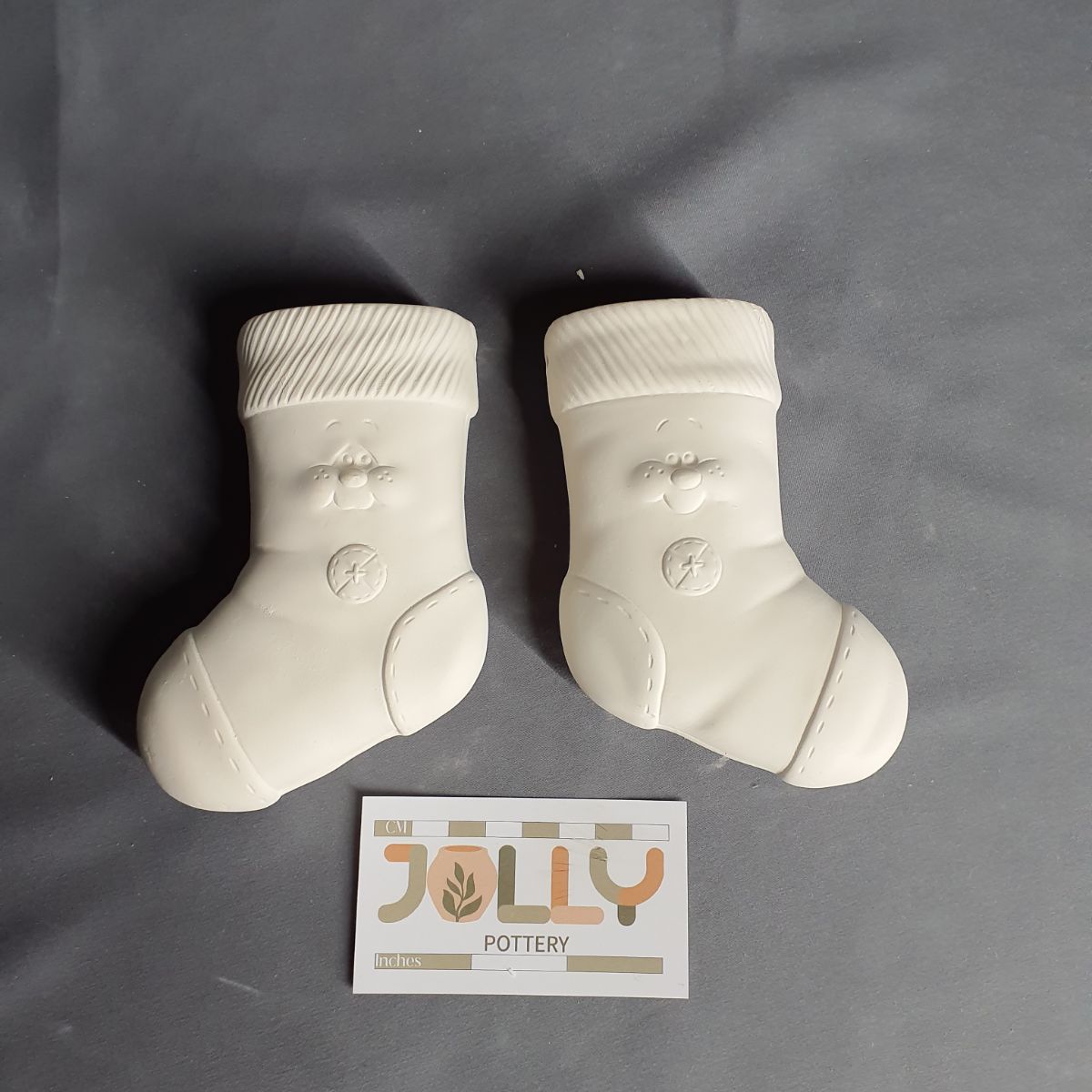 Pair of Stockings with Faces