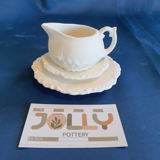 Cream Pot and Saucer