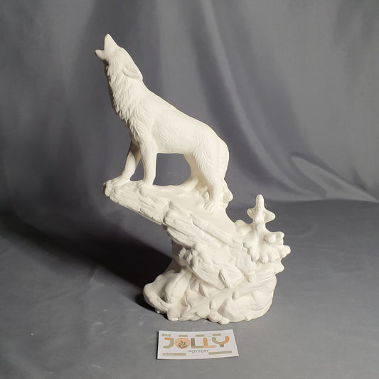 Wolf Howling on Rock