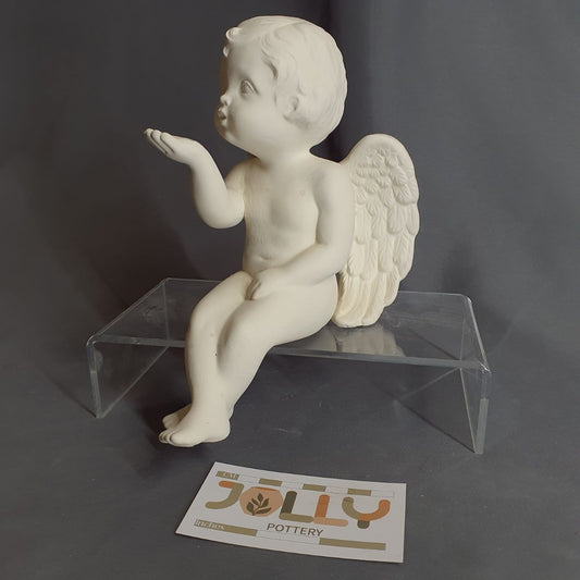 Cherub Blowing Kisses